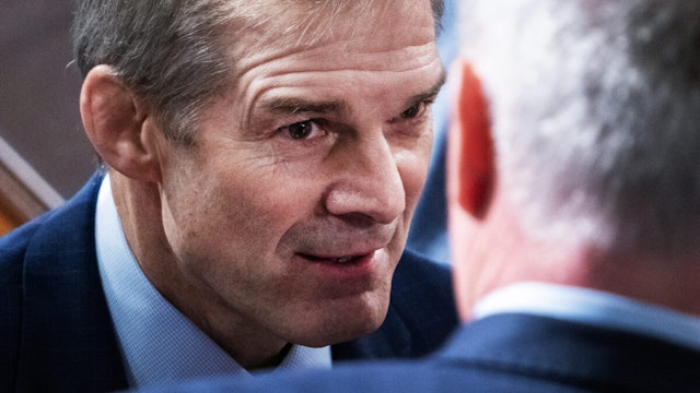 Rep. Jim Jordan, R-Ohio, Republican nominee for speaker of the House, and Rep. Kevin McCarthy, R-Calif., right, are seen on the House floor of the U.S. Capitol after a second ballot in which Jordan failed to receive enough votes to win the position on Wednesday, October 18, 2023.