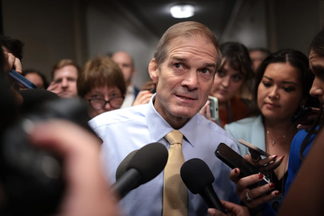Rep. Jim Jordan (R-OH) speaks to reporters as House Republicans hold a caucus meeting at the Longworth House Office Building on October 13, 2023 in Washington, DC.