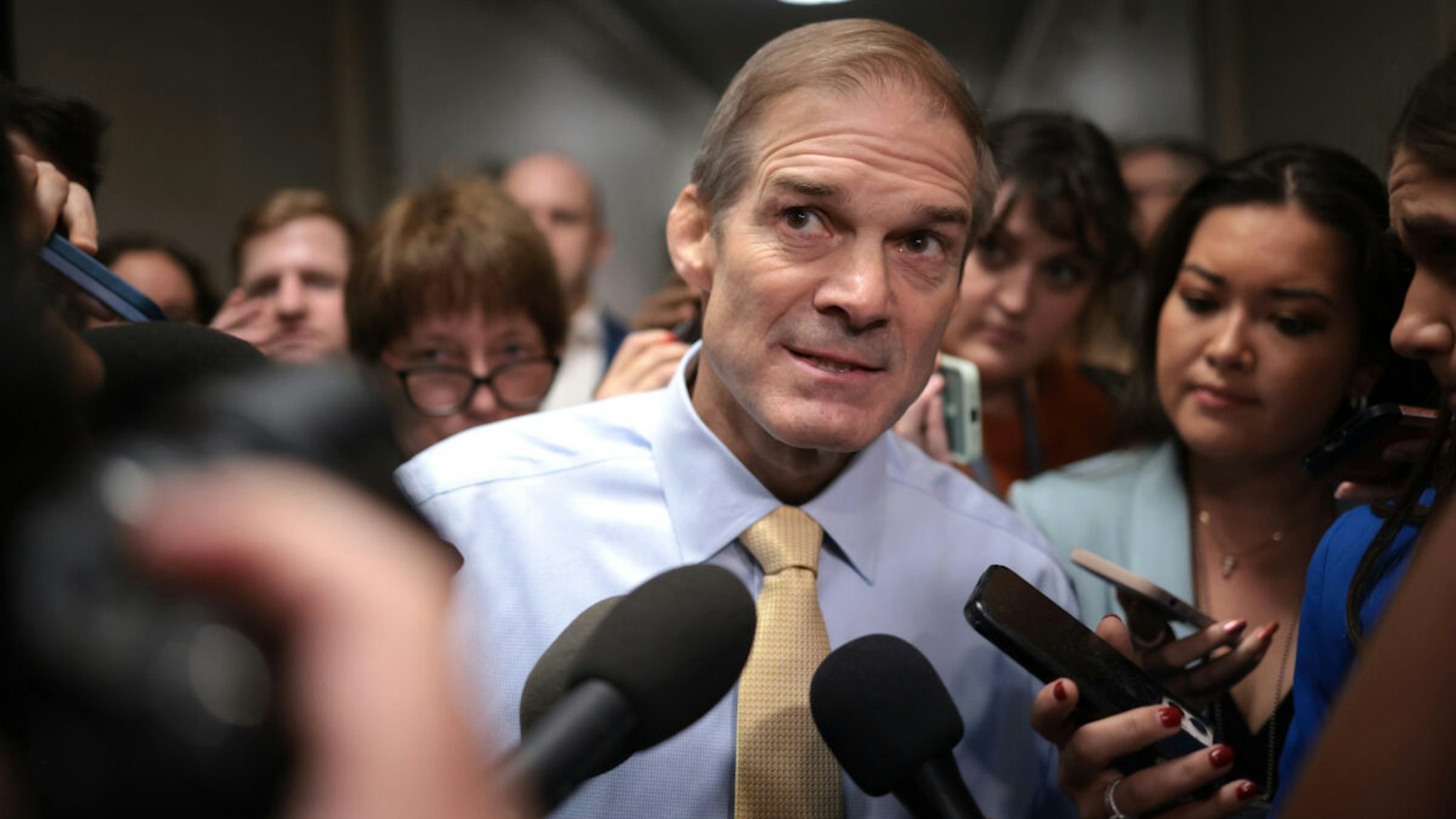 Rep. Jim Jordan (R-OH) speaks to reporters as House Republicans hold a caucus meeting at the Longworth House Office Building on October 13, 2023 in Washington, DC.