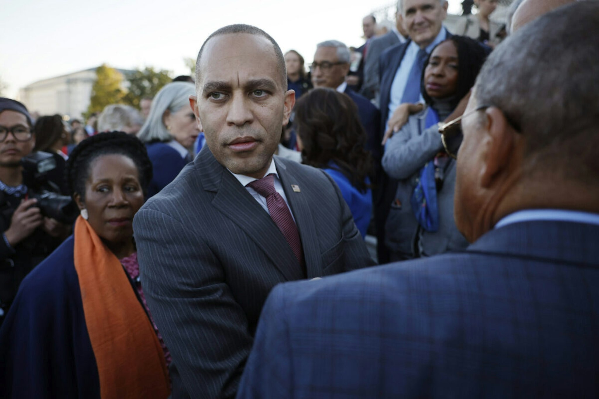House Minority Leader Hakeem Jeffries (D-NY) talks with fellow House Democrat following a rally on the East Steps of the U.S. Capitol on October 13, 2023 in Washington, DC.