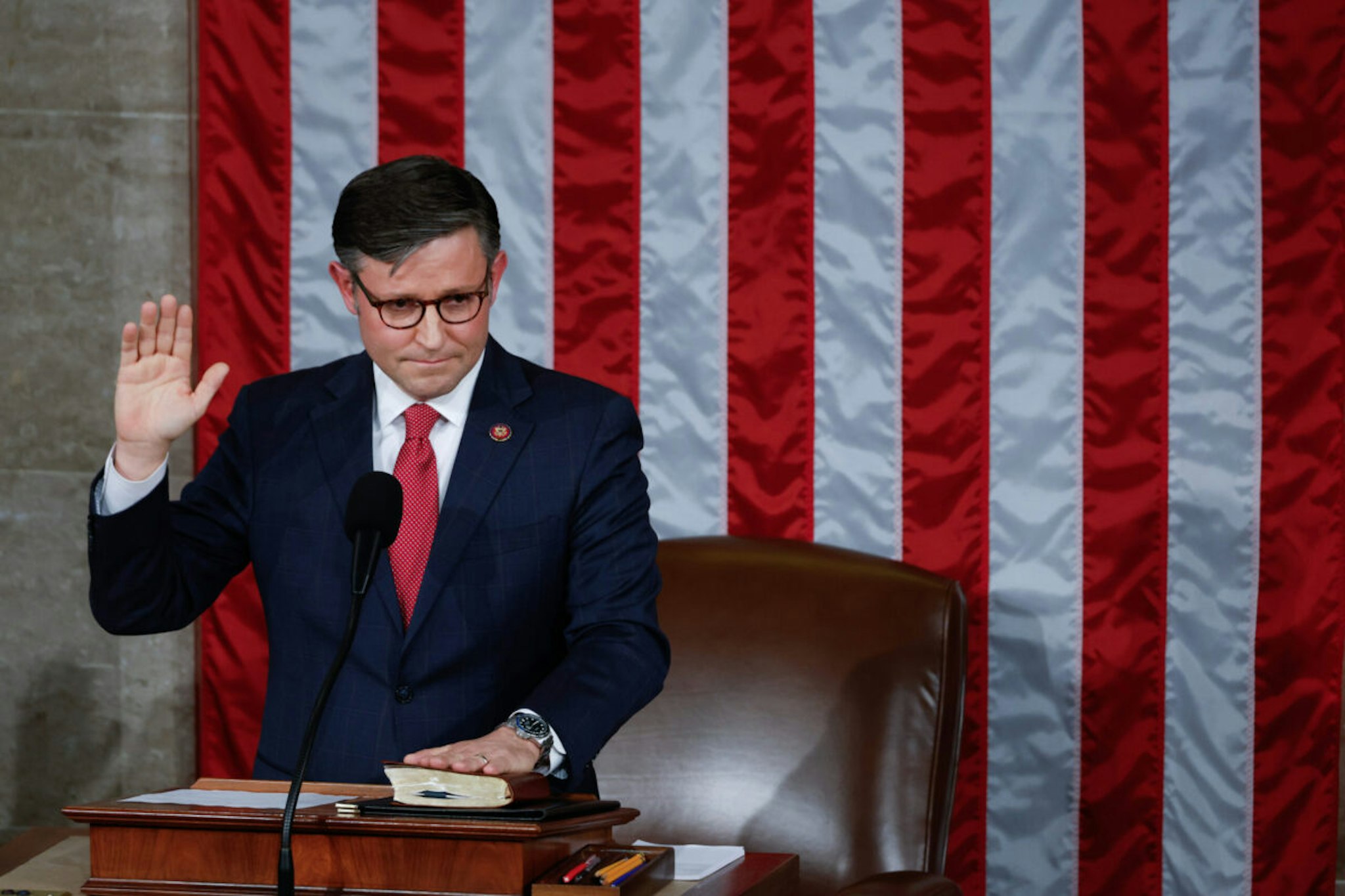 Representative Mike Johnson, a Republican from Louisiana, is sworn-in after becoming US House speaker in the House Chamber at the US Capitol in Washington, DC, US, on Wednesday, Oct. 25, 2023.
