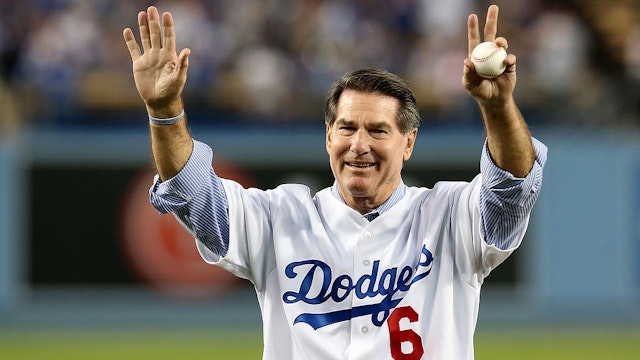 LOS ANGELES, CA - OCTOBER 07: Los Angeles Dodgers legend Steve Garvey throws out a ceremonial first pitch before the Dodgers take on the Atlanta Braves in Game Four of the National League Division Series at Dodger Stadium on October 7, 2013 in Los Angeles, California.