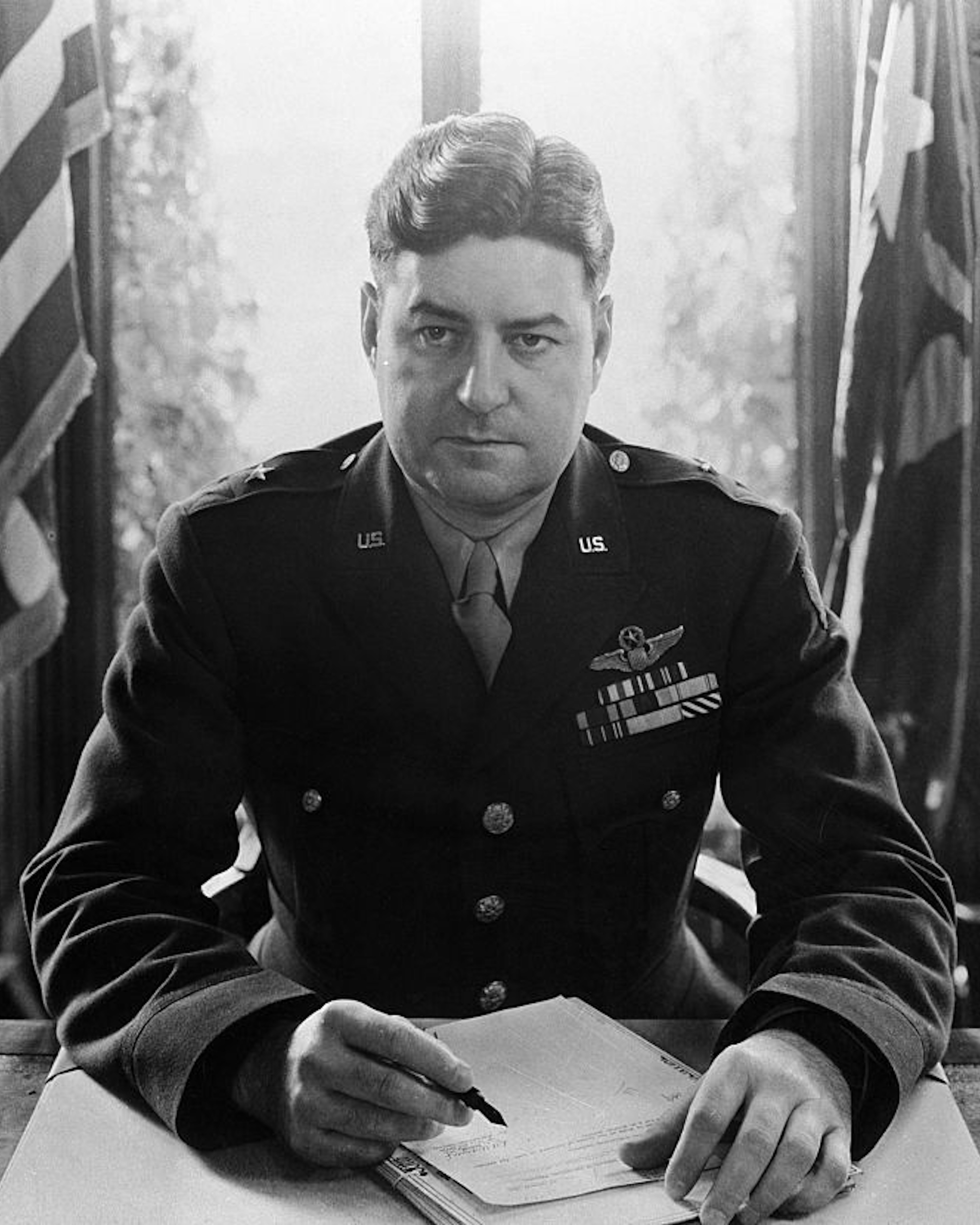 (Original Caption) 1944-Major General Curtis Le May behind desk.