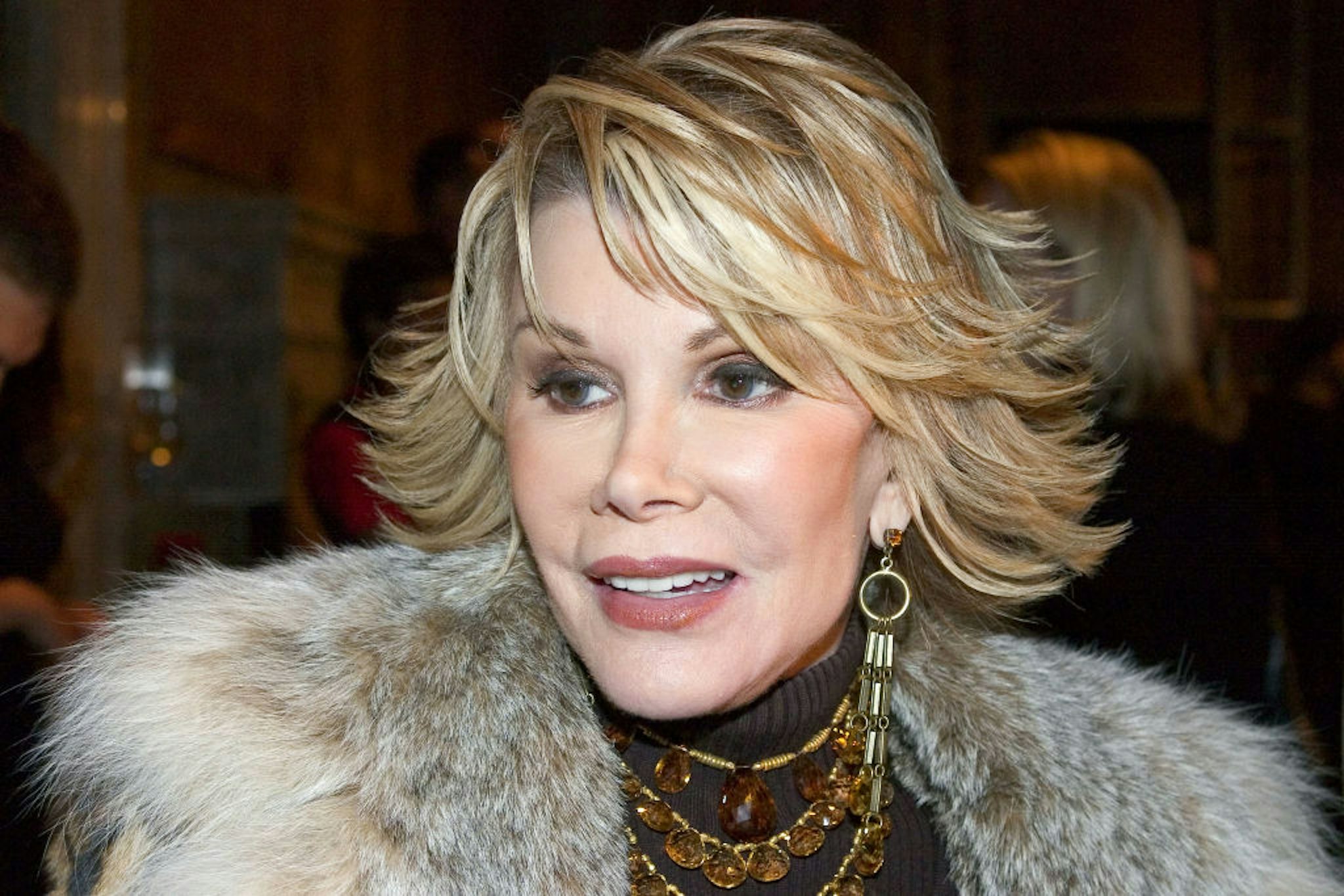 NEW YORK - OCTOBER 25: Television personality Joan Rivers arrives for the Banana Republic 2005 Spring Collection at the New York Public Library October 25, 2004 in New York City. (Photo by Astrid Stawiarz/Getty Images)