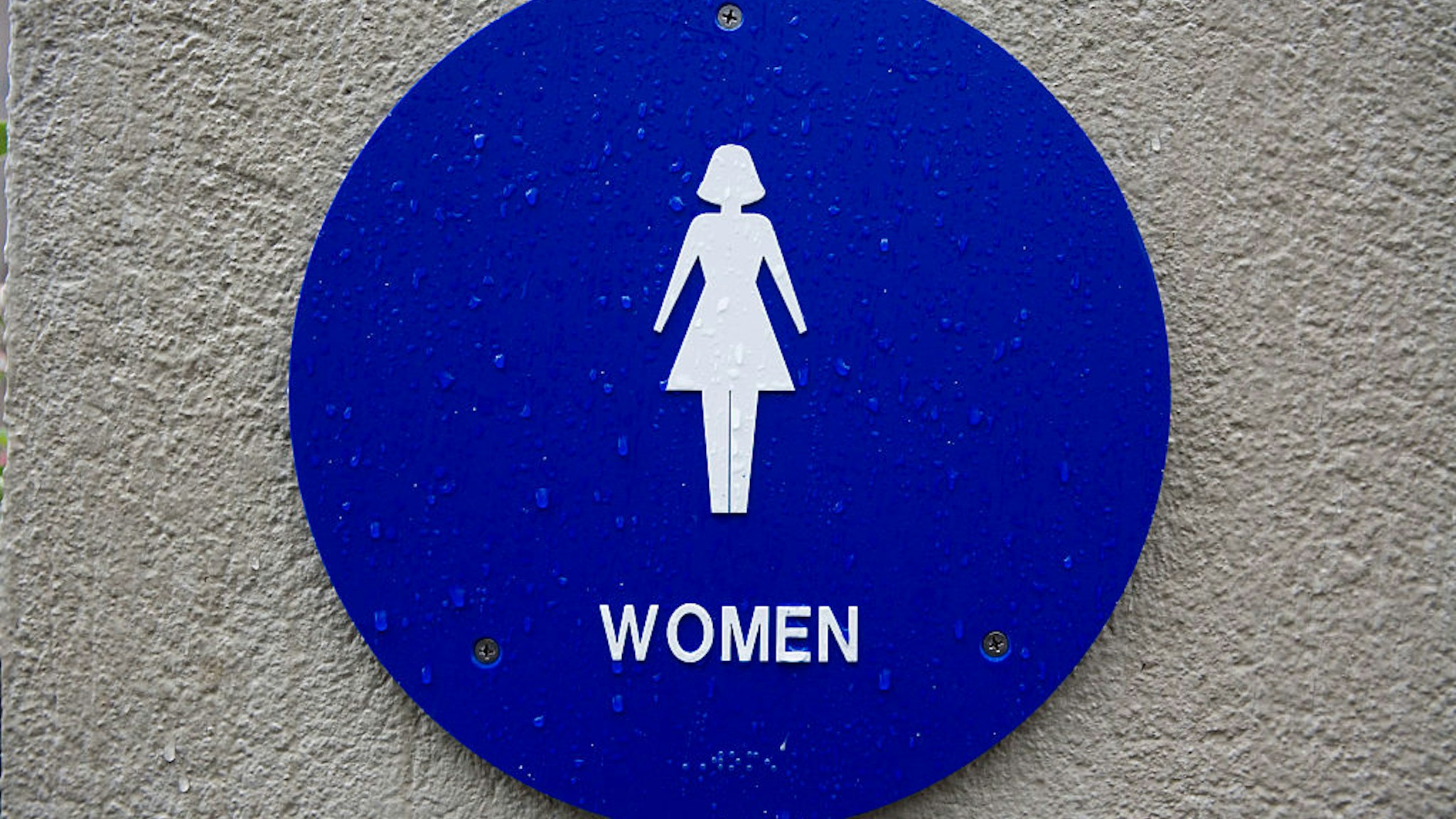 A sign for bathroom for women in a garage in San Francisco, California. (Photo by Ramin Talaie/Corbis via Getty Images)