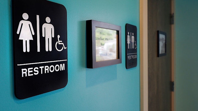 DURHAM, NC - MAY 10: Unisex signs hang outside bathrooms at Toast Paninoteca on May 10, 2016 in Durham, North Carolina. Debate over transgender bathroom access spreads nationwide as the U.S. Department of Justice countersues North Carolina Governor Pat McCrory from enforcing the provisions of House Bill 2 (HB2) that dictate what bathrooms transgender individuals can use. (Photo by Sara D. Davis/Getty Images)