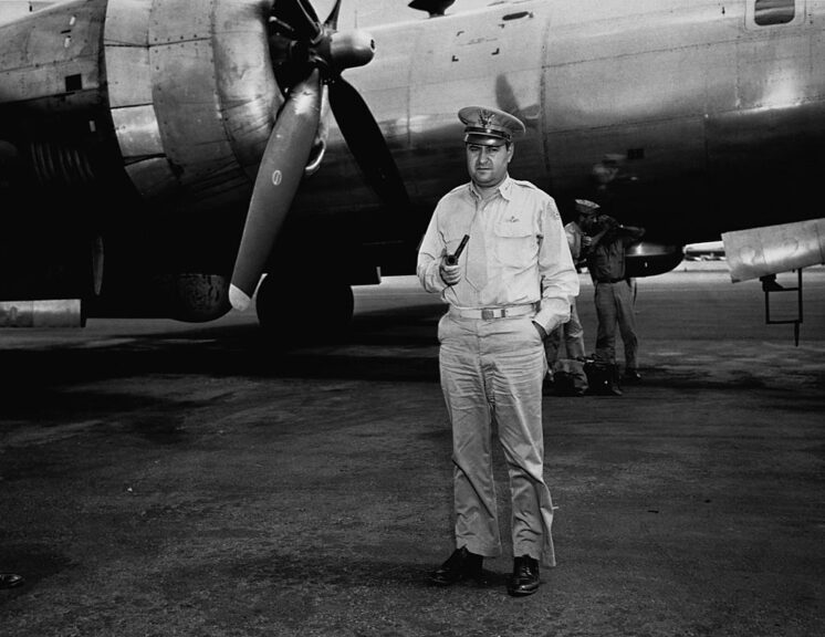 Major General Curtis Lemay, head of the bomber command against Japan, stands in front of a group of B-29 bombers at a base in the Mariana Islands. (Photo by © CORBIS/Corbis via Getty Images)