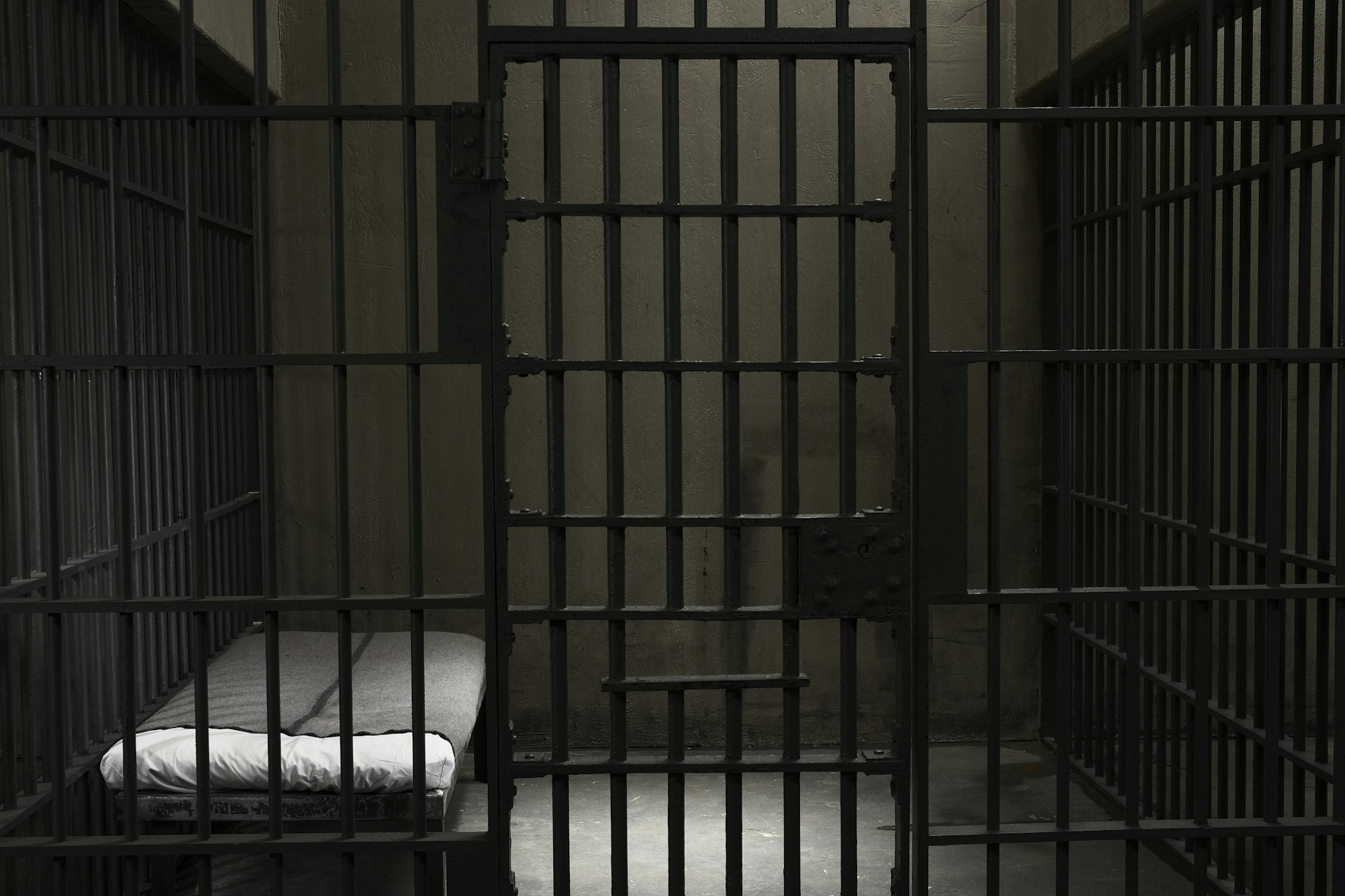 Empty prison cell - stock photo