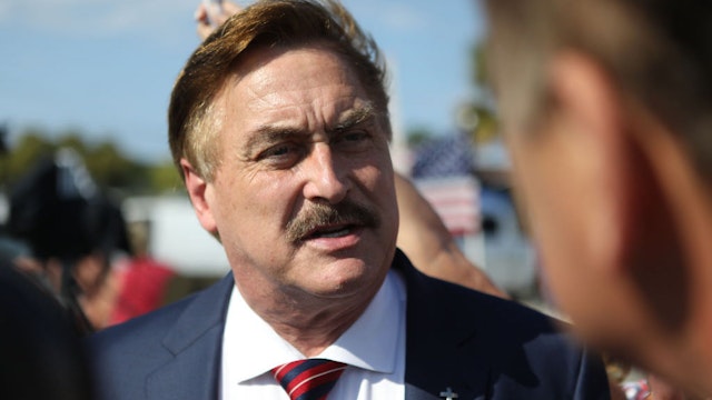 WEST PALM BEACH, FL - APRIL 04: MyPillow Guy CEO Mike Lindell arrives at a gathering of supporters of former U.S. President Donald Trump near Trump's residence at the Mar-a-Lago Club on April 4, 2023 in West Palm Florida. Trump pleaded not guilty in a Manhattan courtroom today to 34 counts related to money paid to adult film star Stormy Daniels in 2016, the first criminal charges for any former U.S. president. (Photo by Octavio Jones/Getty Images)