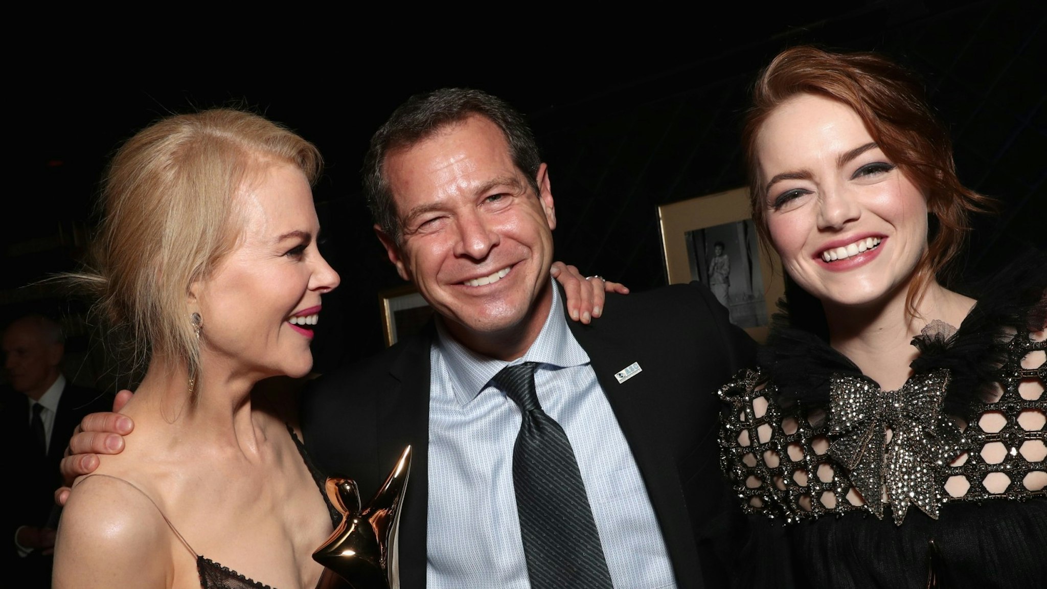 Actress Nicole Kidman, President of Advanced Security Concepts Inc. Oded Krashinsky, and actress Emma Stone attend The 6th AACTA International Awards on January 6, 2017 in Los Angeles, California.