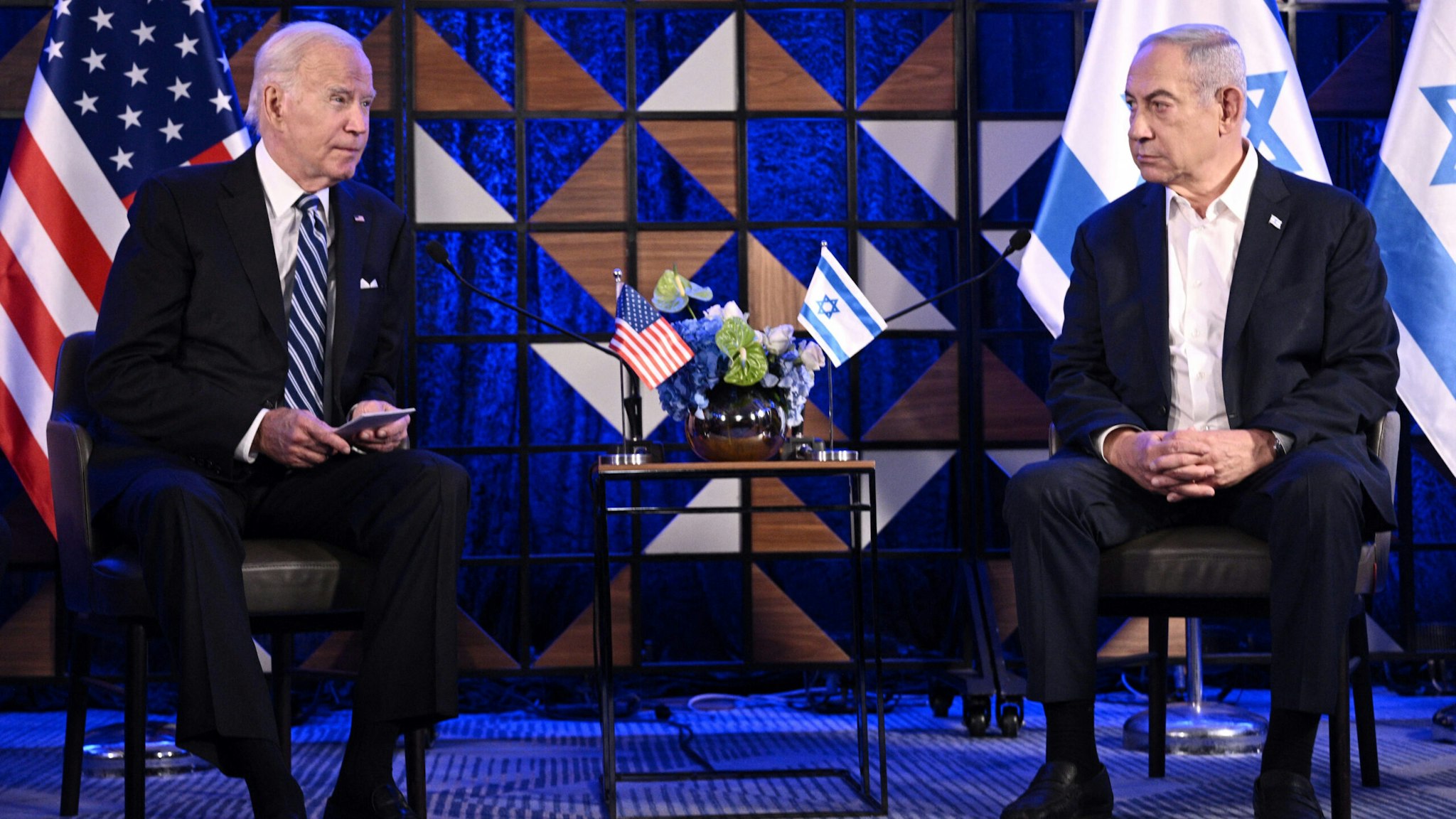 US President Joe Biden (L) meets with Israel's Prime Minister Benjamin Netanyahu in Tel Aviv on October 18, 2023, amid the ongoing battles between Israel and the Palestinian group Hamas. US President Joe Biden landed in Tel Aviv on October 18, 2023 as Middle East anger flared after hundreds were killed when a rocket struck a hospital in war-torn Gaza, with Israel and the Palestinians quick to trade blame.