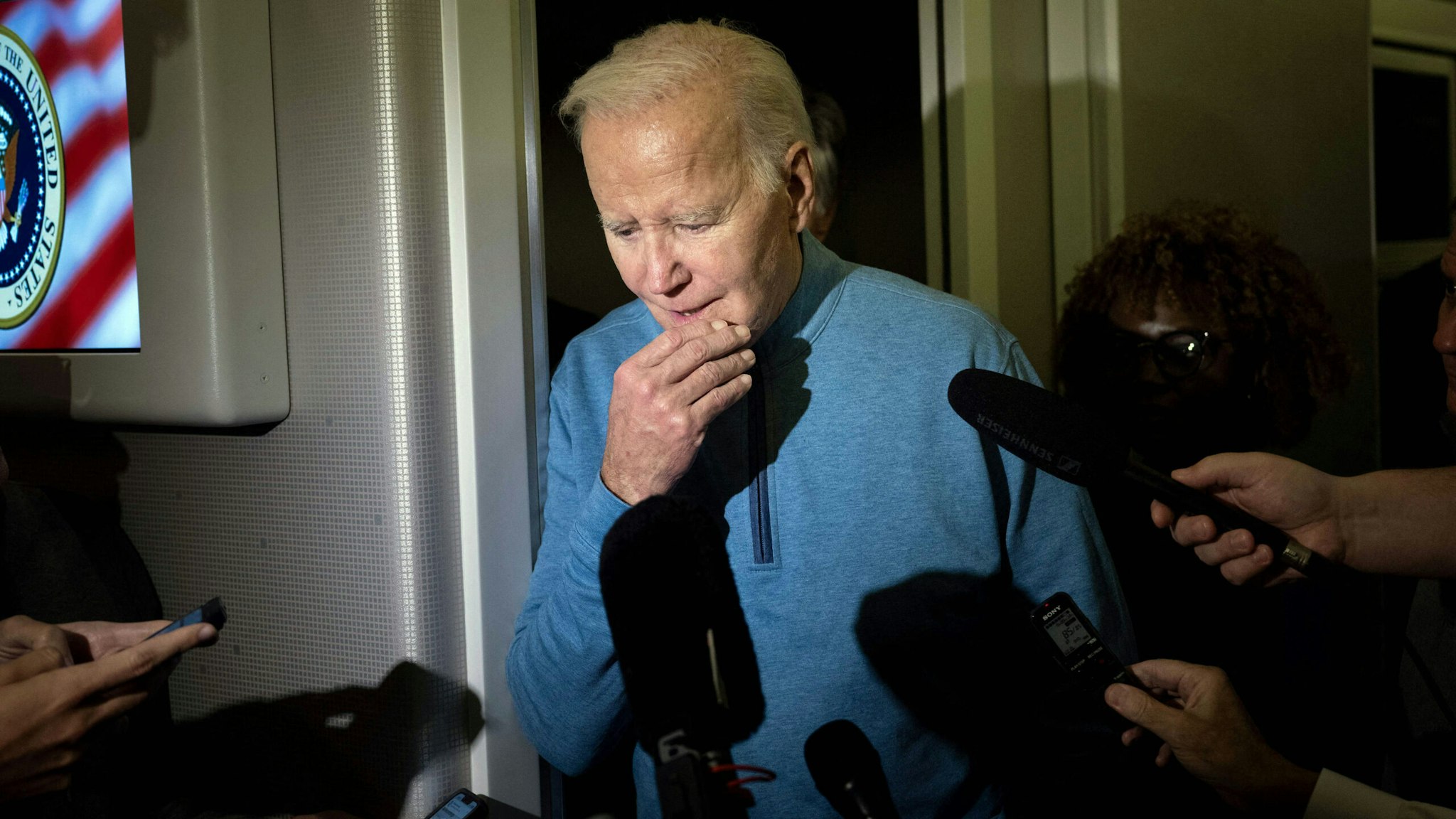 US President Joe Biden speaks to the press aboard Air Force One during a refueling stop at Ramstein Air Base on October 18, 2023 as he returns from a visit to Israel.