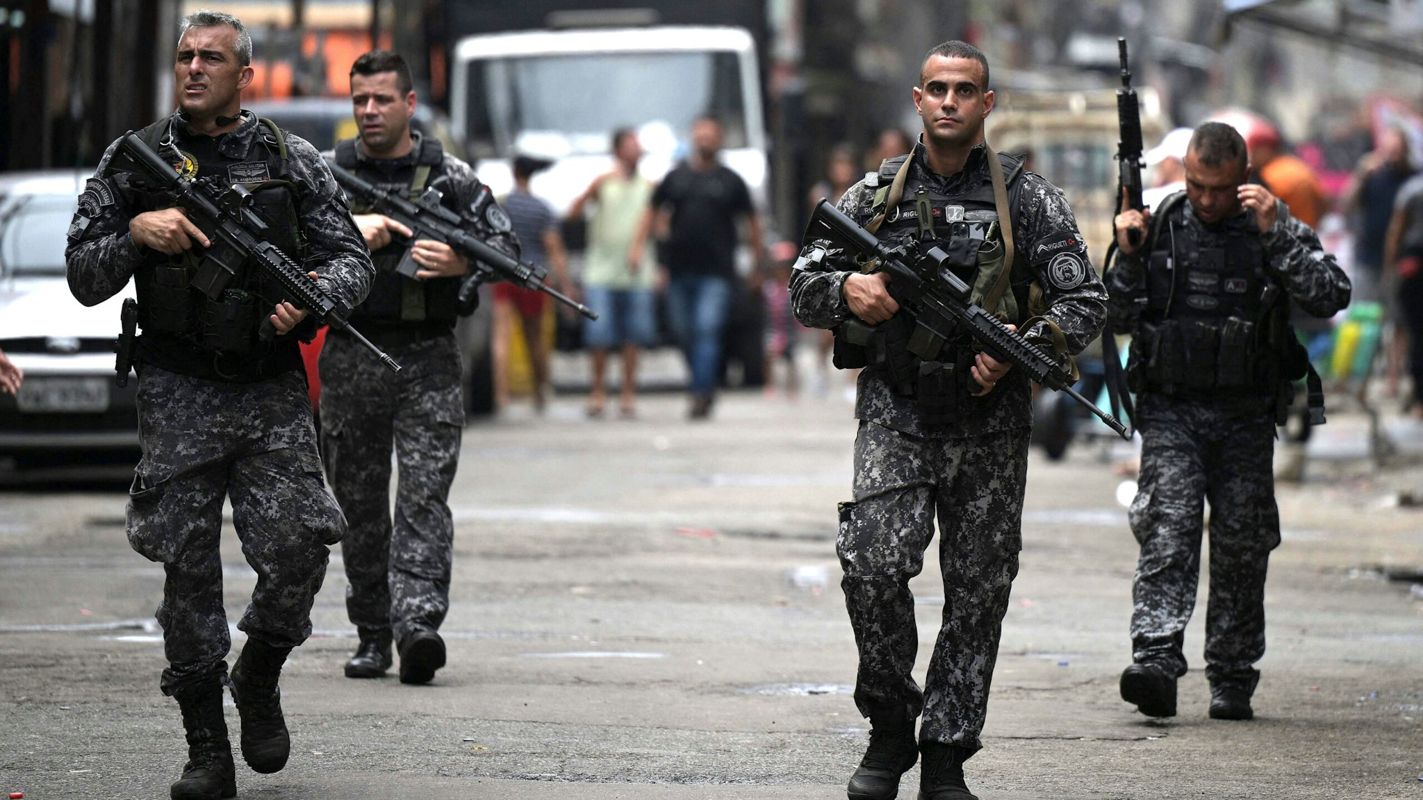 Police officers conduct an operation against drug dealers at the Mare favela in Rio de Janeiro, Brazil, on October 9, 2023.