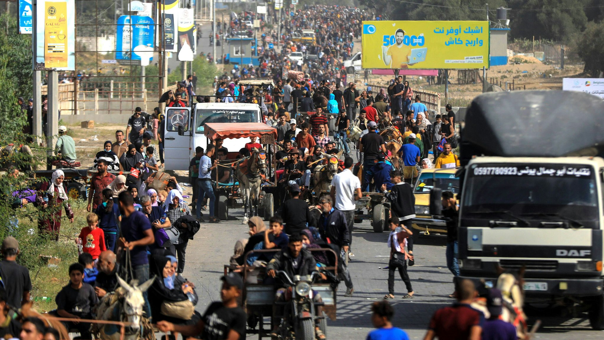 Palestinian people are seen on their way from Gaza City toward south, in central Gaza Strip, on Nov. 10, 2023. In Gaza, people continued to flee southwards. More than 50,000 people fled on foot or donkey carts on Thursday, said the UN Office for the Coordination of Humanitarian Affairs OCHA.