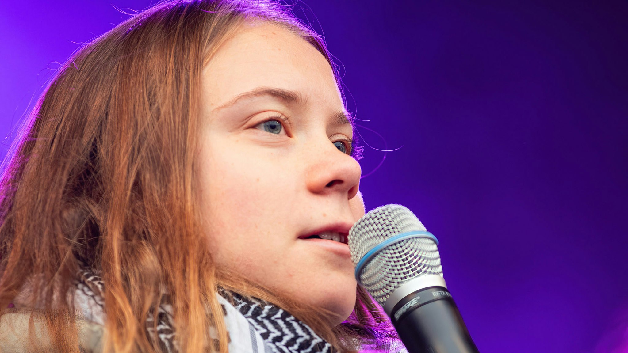 AMSTERDAM, NETHERLANDS - 2023/11/12: Greta Thunberg seen on stage during the demonstration. An estimated 85,000 demonstrators took part in a peaceful climate march with no arrests. This surpassed the climate demonstration of two-years-ago which had 45,000 participants. The demonstrators walked a route from Dam Square to the Museumplein. On their route they joined a large pro-Palestinian march. Among the marchers was Swedish climate activist Greta Thunberg, she later gave a short speech on the Museumplein. The march was organized by nine organizations, under the name Climate Crisis Coalition, this including Extinction Rebellion, Greenpeace, Oxfam Novib, and the trade union FNV. Also demonstrating was a feminist block, a children's block, an agricultural block, a vegan block, an anti-racism block and a block for sustainable fashion. The climate themes that were highlighted included the phasing out of Government fossil subsidies and a mandatory climate plan for polluting companies.
