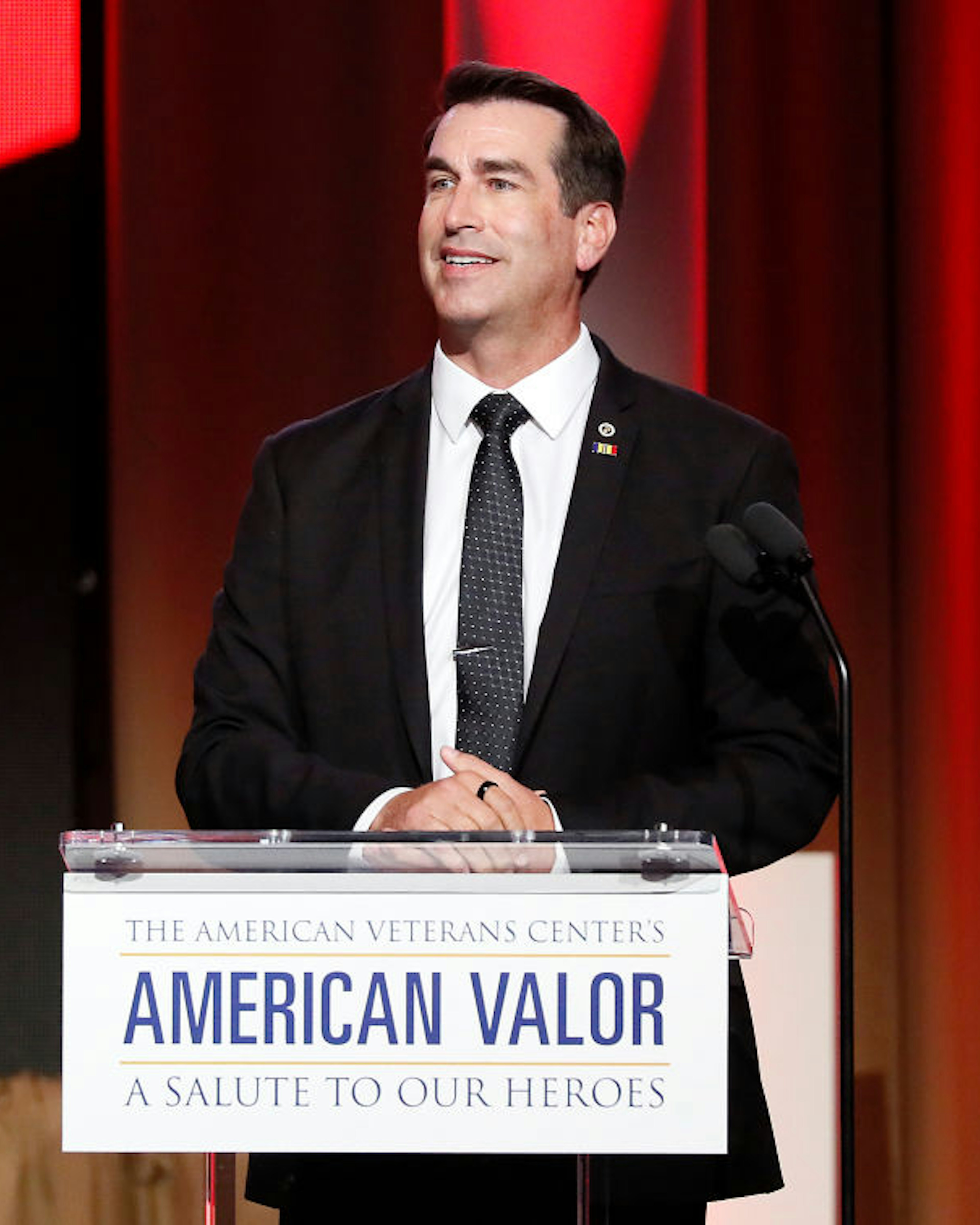 WASHINGTON, DC - OCTOBER 26: Actor/retired United States Marine Corps Reserve officer Rob Riggle speaks at the American Veterans Center’s "2019 American Valor: A Salute to Our Heroes" Veterans Day Special at the Omni Shoreham Hotel on October 26, 2019 in Washington, DC. (Photo by Paul Morigi/Getty Images)