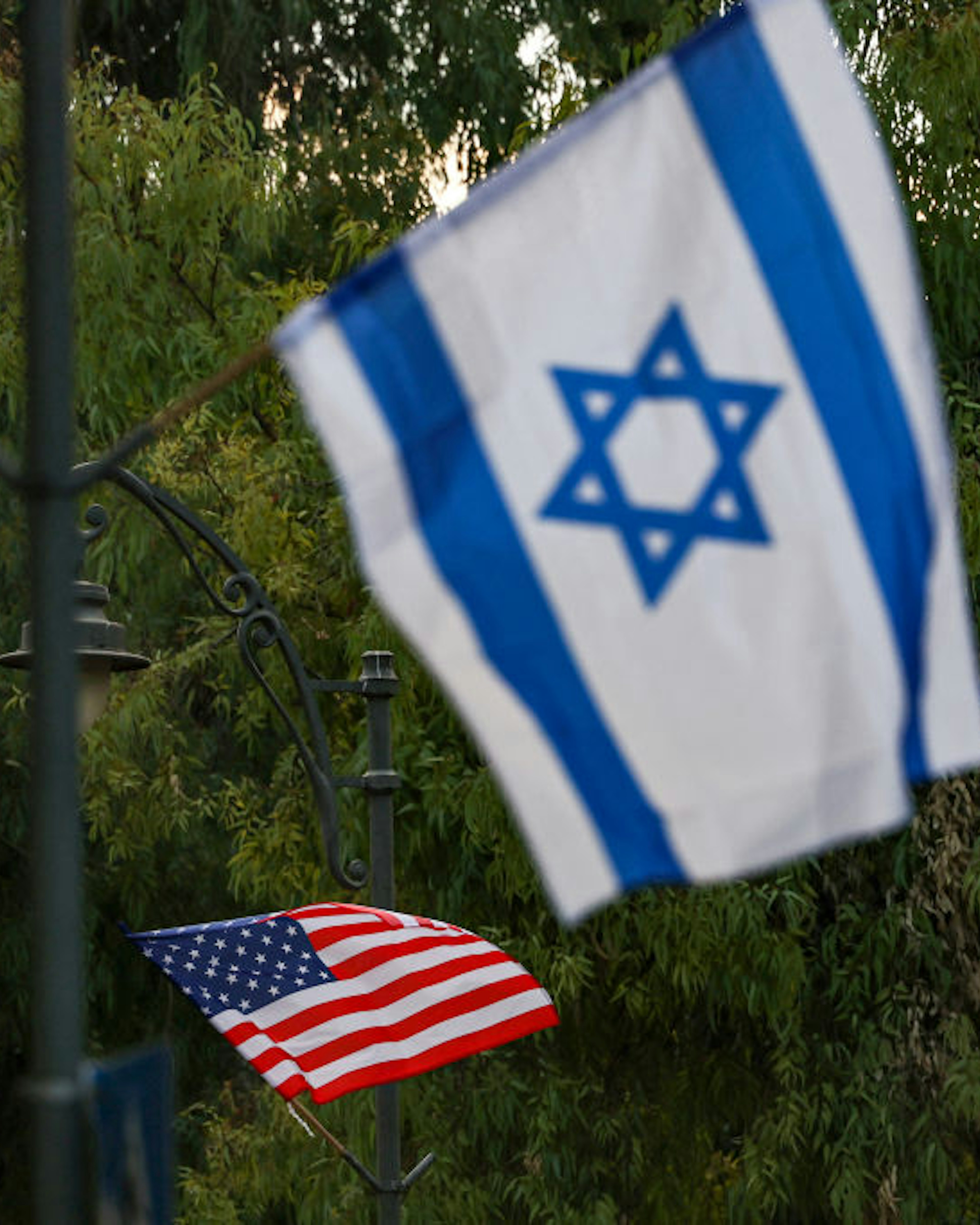 Flags of Israel and the US are hung up along streets by the Jerusalem municipality on July 10, 2022, ahead of US President Joe Biden's upcoming visit to Israel. (Photo by Ahmad GHARABLI / AFP) (Photo by AHMAD GHARABLI/AFP via Getty Images)