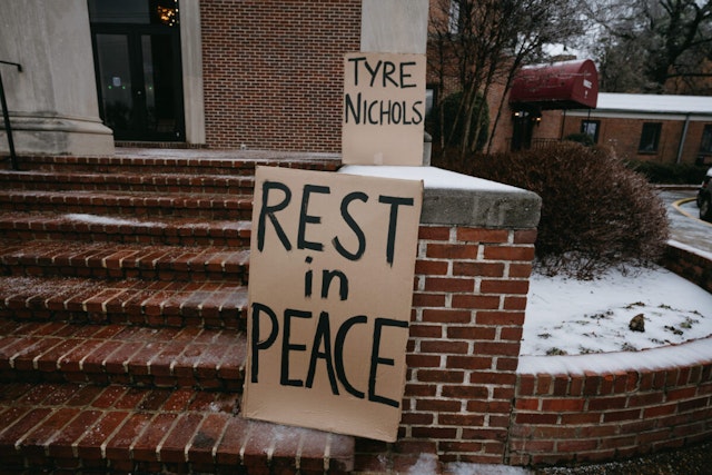 MEMPHIS, TN - FEBRUARY 01: Signs are placed on the steps of Mississippi Boulevard Christian Church on the morning of Tyre Nichols' funeral on February 1, 2023 in Memphis, Tennessee. On January 7th, 29-year-old Nichols was violently beaten for three minutes by Memphis police officers at a traffic stop and died of his injuries. Five Black Memphis Police officers have been fired after an internal investigation found them to be “directly responsible” for the beating and have been charged with “second-degree murder, aggravated assault, two charges of aggravated kidnapping, two charges of official misconduct and one charge of official oppression.”