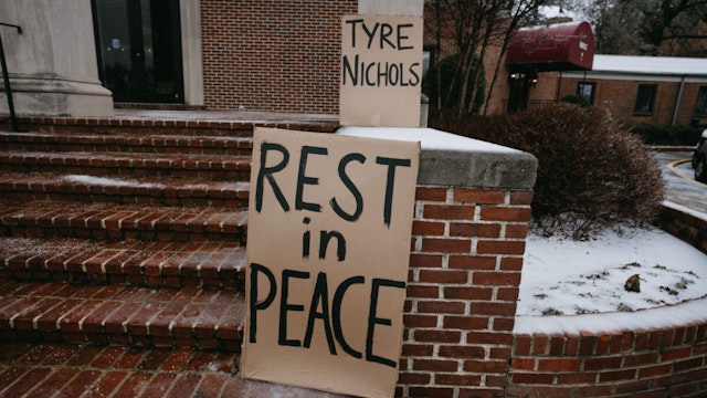 MEMPHIS, TN - FEBRUARY 01: Signs are placed on the steps of Mississippi Boulevard Christian Church on the morning of Tyre Nichols' funeral on February 1, 2023 in Memphis, Tennessee. On January 7th, 29-year-old Nichols was violently beaten for three minutes by Memphis police officers at a traffic stop and died of his injuries. Five Black Memphis Police officers have been fired after an internal investigation found them to be “directly responsible” for the beating and have been charged with “second-degree murder, aggravated assault, two charges of aggravated kidnapping, two charges of official misconduct and one charge of official oppression.”