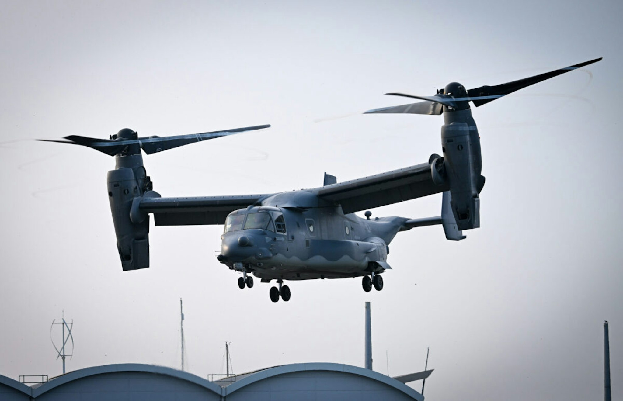 PORTLAND, ENGLAND - MARCH 30: A US Air Force (USAF) Bell-Boeing CV-22B Osprey tiltrotor military aircraft takes off at HeliOperations base, on March 30, 2022 in Portland, United Kingdom.
