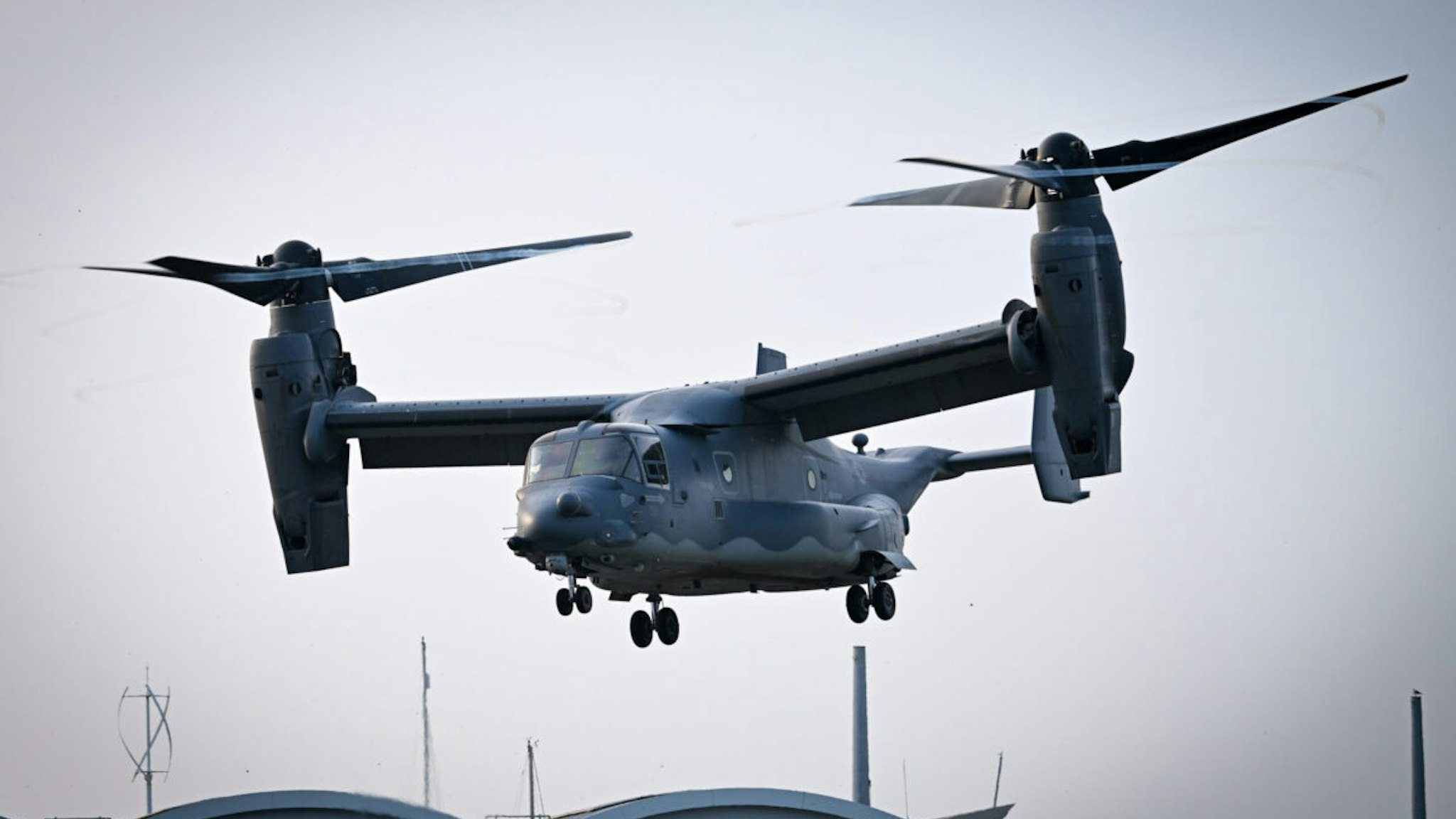 PORTLAND, ENGLAND - MARCH 30: A US Air Force (USAF) Bell-Boeing CV-22B Osprey tiltrotor military aircraft takes off at HeliOperations base, on March 30, 2022 in Portland, United Kingdom.