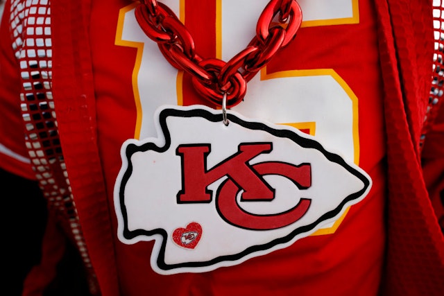 KANSAS CITY, MISSOURI - JANUARY 29: A detailed view of the Kansas City Chiefs logo on a fan prior to the AFC Championship Game against the Cincinnati Bengals at GEHA Field at Arrowhead Stadium on January 29, 2023 in Kansas City, Missouri. (Photo by David Eulitt/Getty Images)