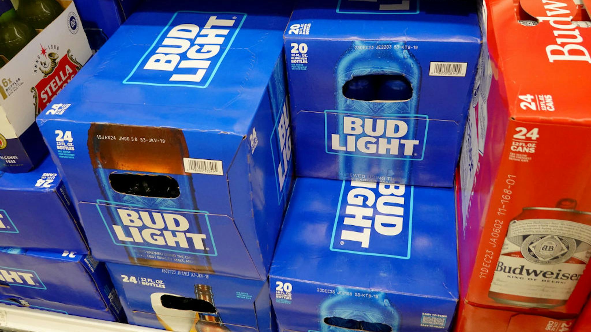Anheuser-Busch Announces Job Cuts Amid Slumping Bud Light Sales MIAMI, FLORIDA - JULY 27: Bud Light, made by Anheuser-Busch, sits on a store shelf on July 27, 2023 in Miami, Florida. Anheuser-Busch InBev announced it will lay off hundreds of corporate employees as its Bud Light beer sales continue to struggle.