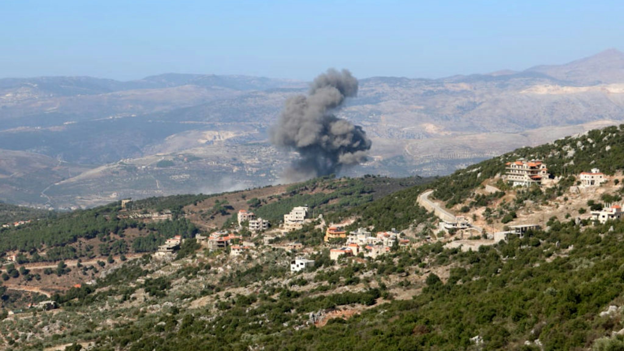 NABATIEH, LEBANON - NOVEMBER 04: Smoke rises after Israeli airstrike on the mountainous areas around Rachaya Al Foukhar and Kfarhamam villages of Hasbaya District of the Nabatieh Governorate in Lebanon on November 04, 2023. Israel and Lebanon are reported to have exchanged attacks on their border.