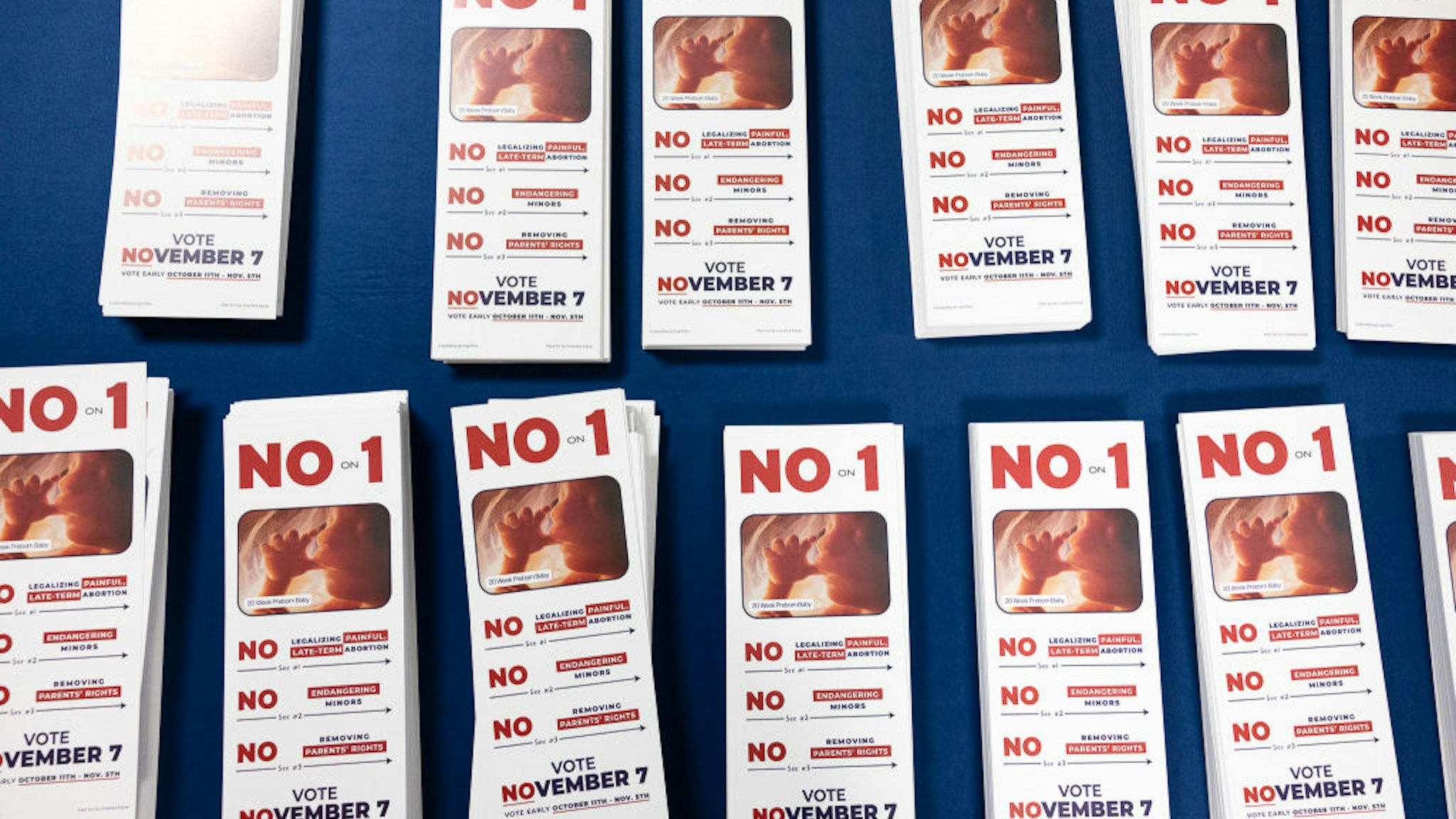 Pro-life pamphlets lay on a table at Columbus Christian Center at a pro-life canvasing meeting in Columbus, Ohio on November 4, 2023. The US state of Ohio will decide whether to guarantee the right to abortion in a potential 2024 bellwether on November 7 as both sides of the American political machine establish their campaign strategies on this crucial issue one year out from the presidential election. Voters will choose whether to amend the midwestern state's constitution to promise the freedom to "make and carry out one's own reproductive decisions, including... abortion," or to leave the document unchanged, allowing for a potential state ban. (Photo by MEGAN JELINGER / AFP)