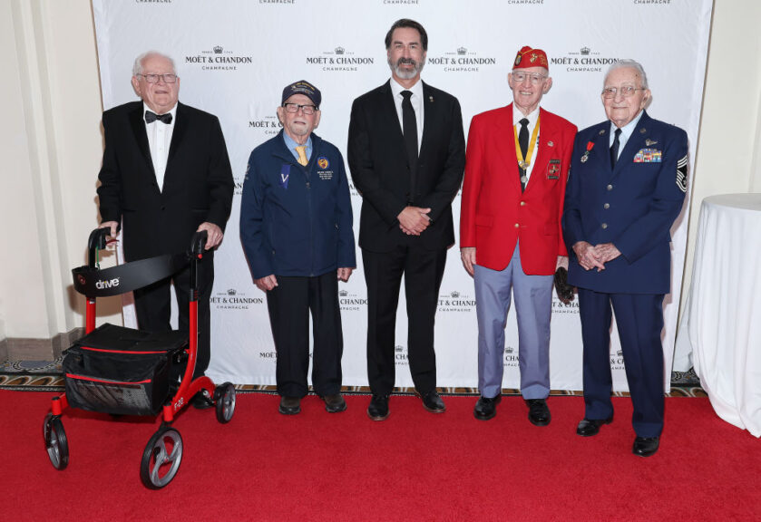 WASHINGTON, DC - NOVEMBER 04: (L to R) Word War II and Korean War veterans Pat Finn, Melvin Hurwitz, Johnny Johnson and Mel Jenner join actor and host Rob Riggle (C) at the 2023 American Valor: A Salute to Our Heroes event at Omni Shoreham Hotel on November 04, 2023 in Washington, DC. (Photo by Paul Morigi/Getty Images)