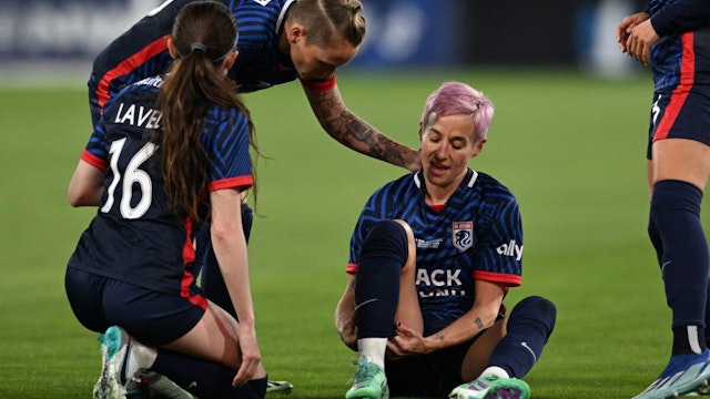 OL Reign's US midfielder #15 Megan Rapinoe reacts on the pitch after an injury in the early minutes of the first half of the National Women's Soccer League final match between OL Reign and Gotham FC at Snapdragon Stadium in San Diego, California, on November 11, 2023. US women's football icon Megan Rapinoe limped out of the final game of her storied career, suffering an apparent ankle injury less than three minutes into the National Women's Soccer League Final.