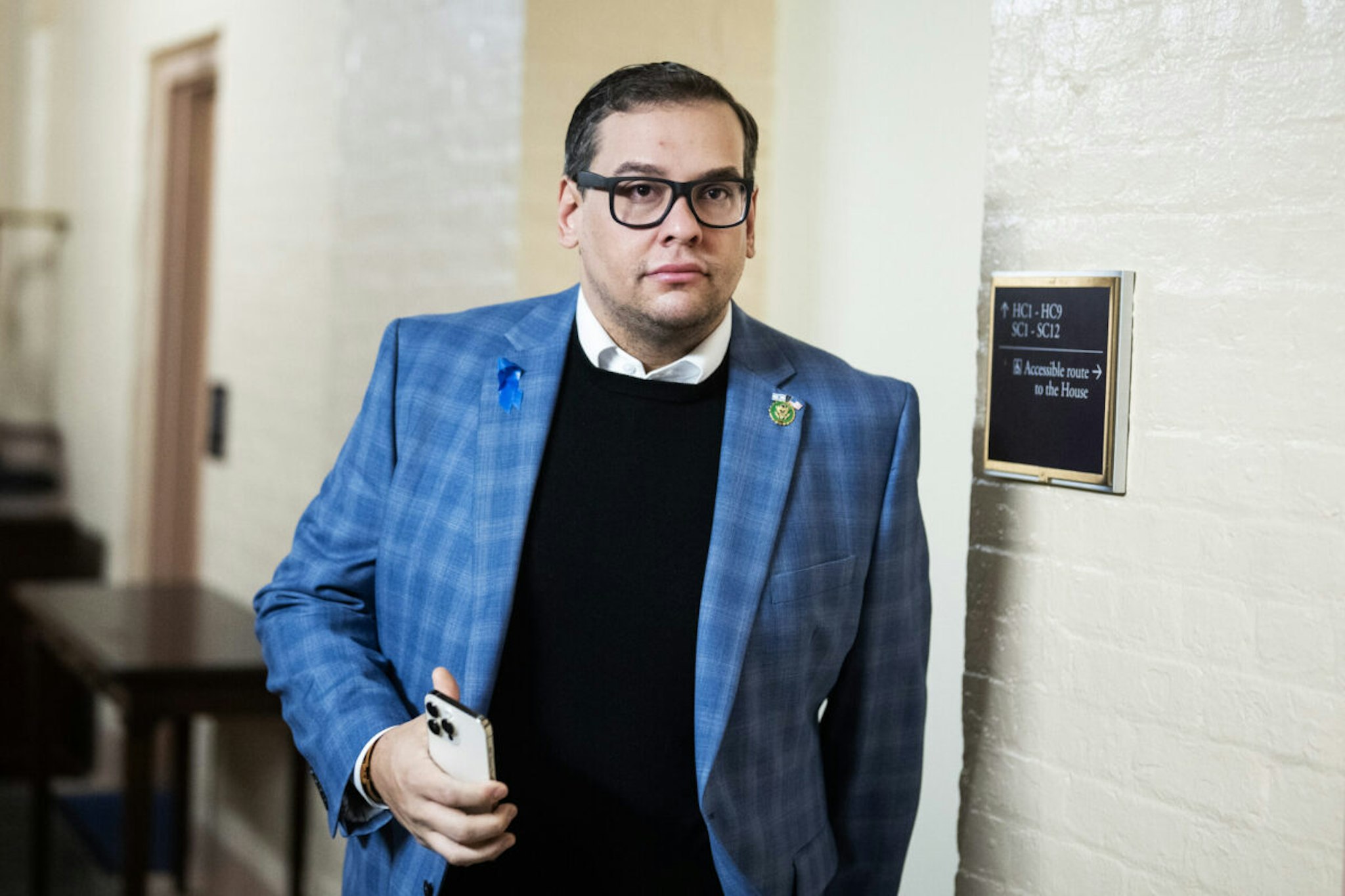 Rep. George Santos, R-N.Y., leaves a meeting of the House Republican Conference in the U.S. Capitol on Tuesday, November 7, 2023.