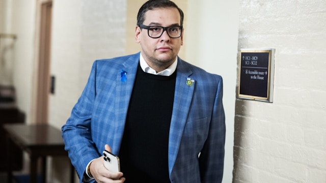 Rep. George Santos, R-N.Y., leaves a meeting of the House Republican Conference in the U.S. Capitol on Tuesday, November 7, 2023.