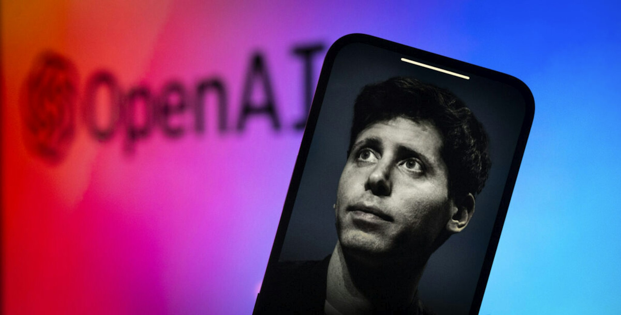 An effigy of former OpenAI CEO Sam Altman is seen on a mobile device screen in this illustration photo taken in Warsaw, Poland on 21 November, 2023.