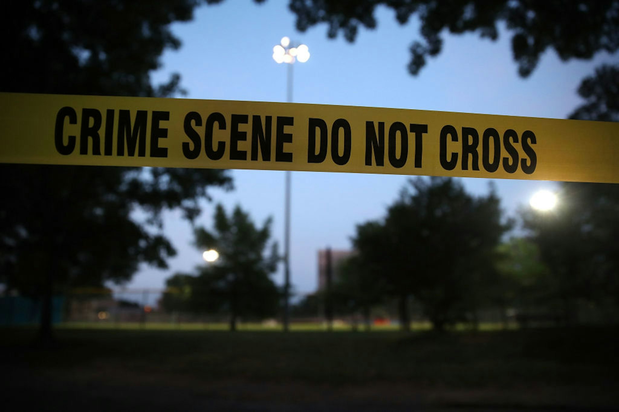 ALEXANDRIA, VA - JUNE 15: Crime scene tape surrounds the Eugene Simpson Field, the site where a gunman opened fire June 15, 2017 in Alexandria, Virginia. Multiple injuries were reported from the instance, the site where a congressional baseball team was holding an early morning practice, including House Republican Whip Steve Scalise (R-LA) who was shot in the hip. (Photo by Mark Wilson/Getty Images)