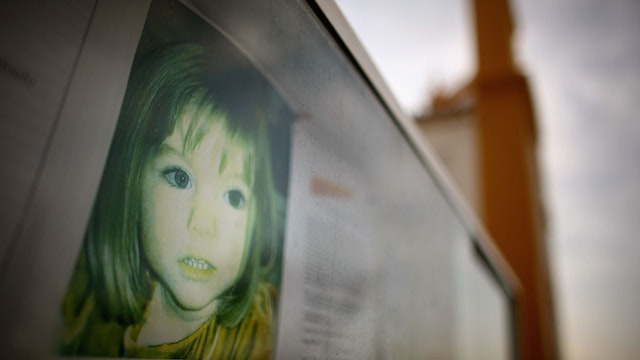 A faded photograph of Madeleine McCann is displayed on a church notice board,, where the toddler disappeared from the family holiday apartment last May, April 5, 2008 in Praia da Luz, Portugal.