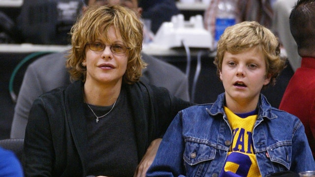 Actress Meg Ryan and son Jack Quaid attend the game between the Los Angeles Lakers and the Portland Trailblazers on April 6, 2004 in Los Angeles, California.