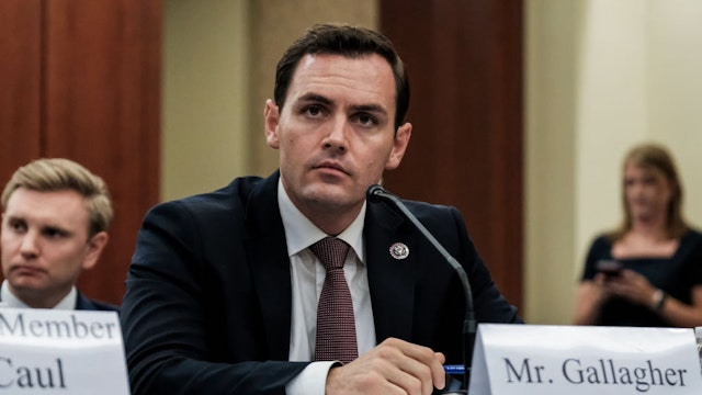 Representative Mike Gallagher, a Republican from Wisconsin, listens during a Republican led House Select Subcommittee on the Coronavirus Crisis forum at the U.S. Capitol in Washington, D.C., U.S., on Tuesday, June 29, 2021. While coronavirus infections and deaths have fallen dramatically since President Biden last month said he ordered the U.S. intelligence community to "redouble" its effort to determine where the coronavirus came from, after conflicting assessments of whether its origins are natural or a lab accident. Photographer: Michael A. McCoy/Bloomberg