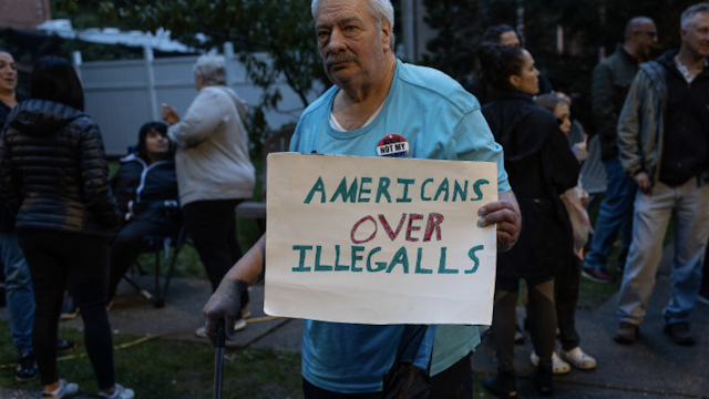 Neighborhood residents, joined by anti-migrant activists, hold an 8th demonstration and rally to protest the city housing migrants at a closed Catholic school, St. John Villa Academy, September 28, 2023, in the Arrochar neighborhood of Staten Island, New York.