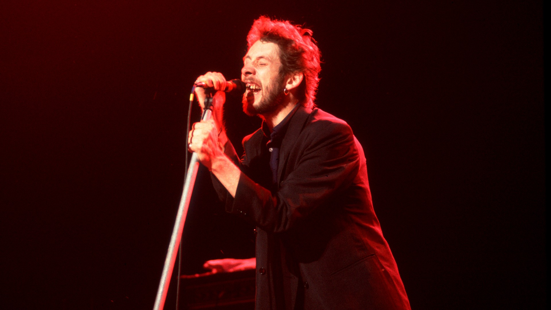 Shane MacGowan, lead singer of The Pogues, dies at 65