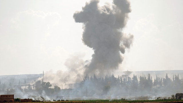 10/14/2023 Idlib, Syria. After seven airstrikes, smoke billows into the sky as Russian warplanes bomb the outskirts of Idlib Governorate in northwestern Syria.