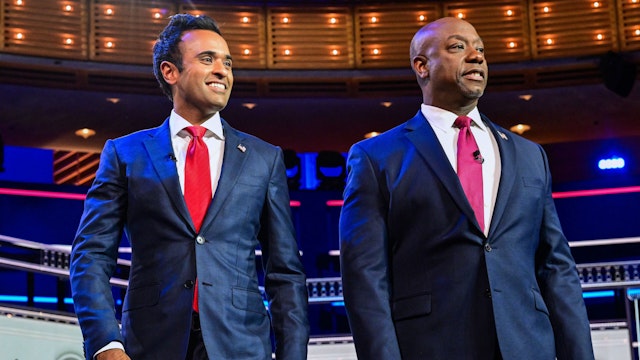 Entrepreneur Vivek Ramaswamy (L) and US Senator from South Carolina Tim Scott (R) arrive for the third Republican presidential primary debate at the Knight Concert Hall at the Adrienne Arsht Center for the Performing Arts in Miami, Florida, on November 8, 2023.