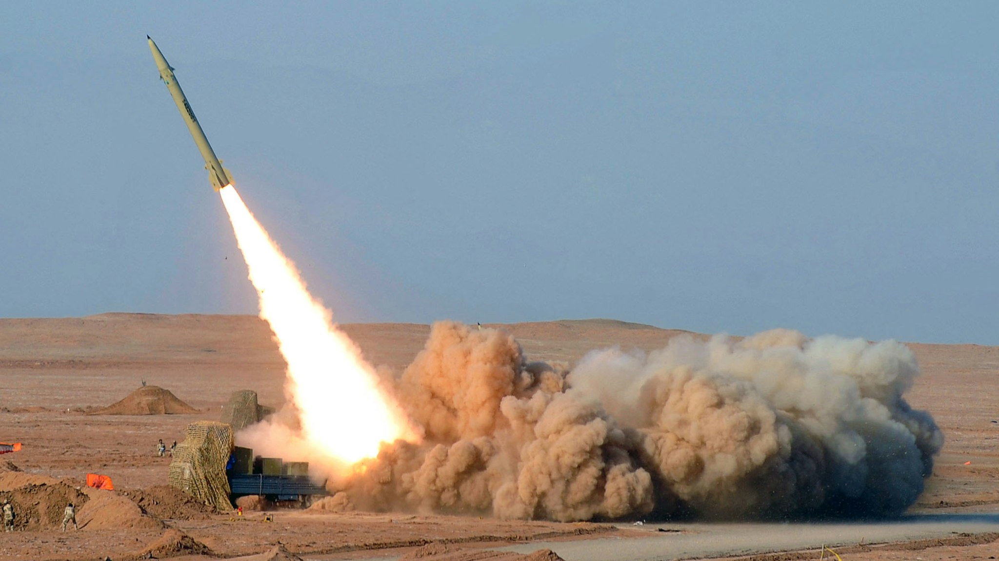 TOPSHOT - In a picture obtained from Iran's ISNA news agency on July 3, 2012, shows AN Iranian short-range missile (Fateh) launched during the second day of military exercises, codenamed Great Prophet-7, for Iran's elite Revolutionary Guards at an undisclosed location in Iran's Kavir Desert.