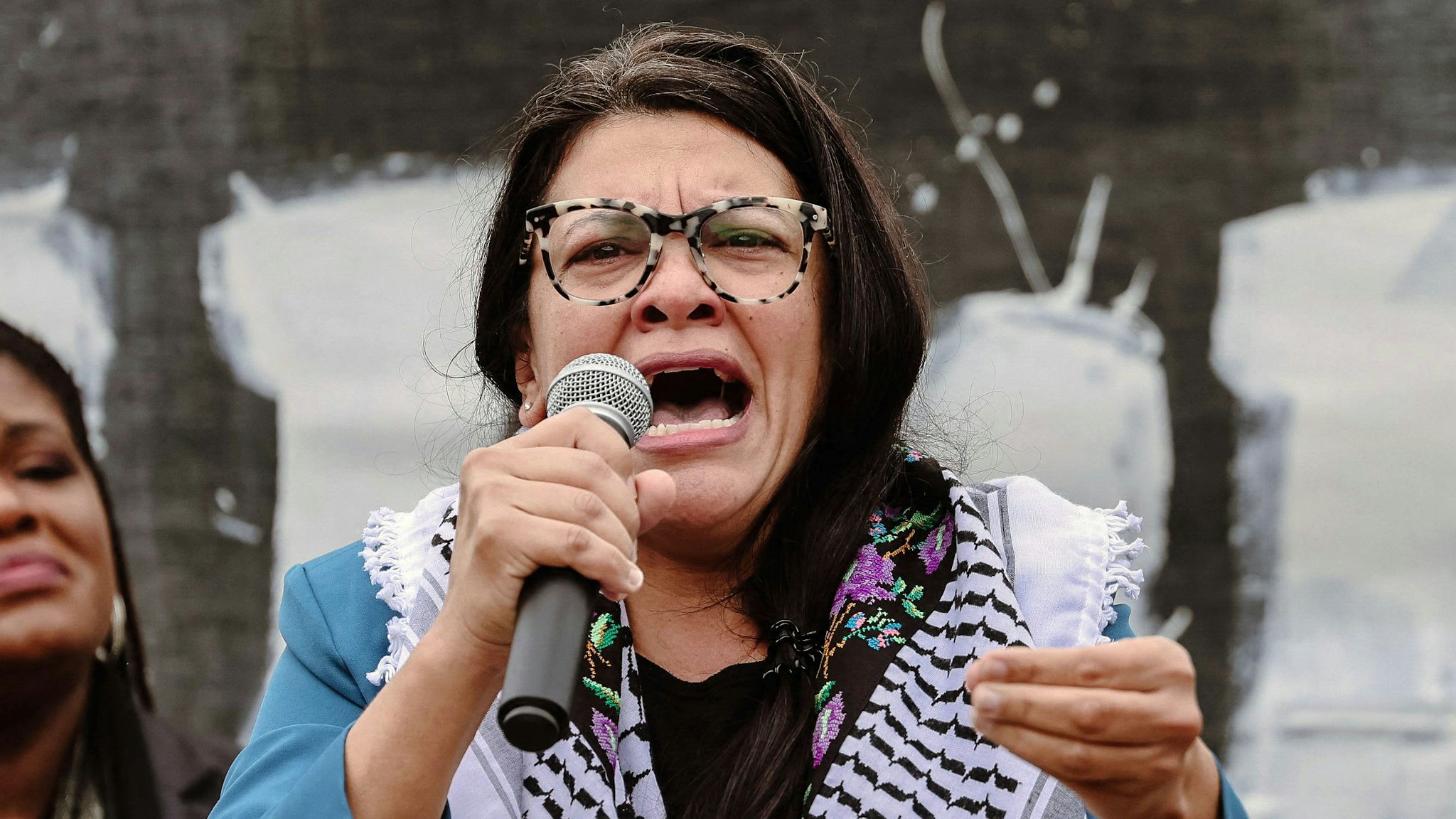 10/20/2023, Washington, DC, united states. Rep. Rashida Tlaib delivers a passionate speech, emphasizing the necessity of a ceasefire in Gaza during a rally at the U.S. Capitol. Thousands of demonstrators convened to urge a ceasefire in Gaza, with Representative Cori Bush (D-MO) visible on stage in the background