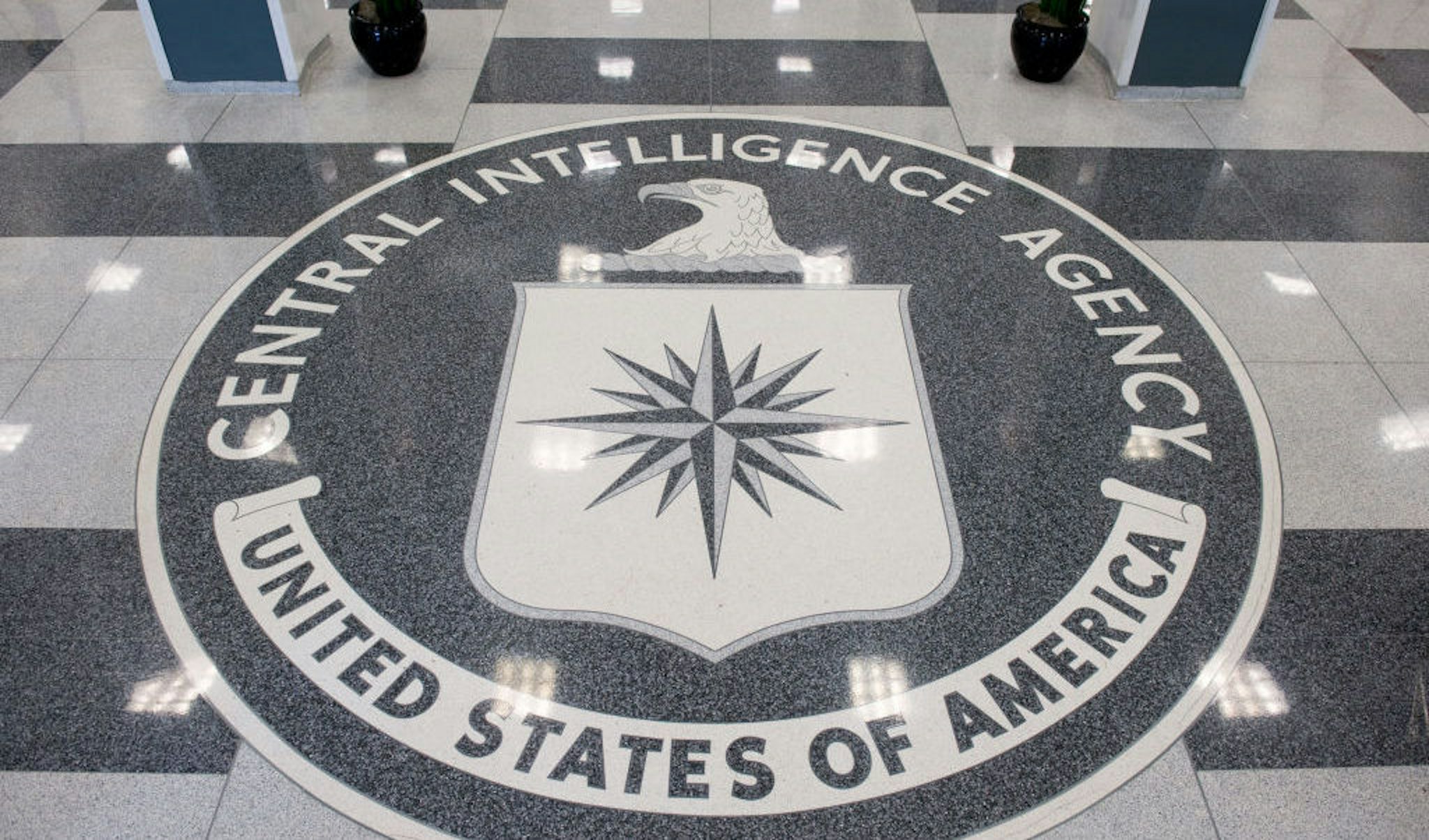 The Central Intelligence Agency (CIA) seal is displayed in the lobby of CIA Headquarters in Langley, Virginia, on August 14, 2008. (Photo by SAUL LOEB/AFP via Getty Images)