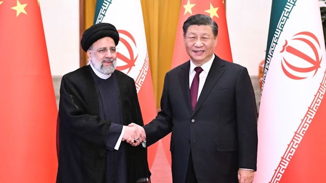 Chinese President Xi Jinping holds a welcoming ceremony for visiting President of the Islamic Republic of Iran Ebrahim Raisi prior to their talks at the Great Hall of the People in Beijing, capital of China, Feb. 14, 2023. (Photo by Yan Yan/Xinhua via Getty Images)