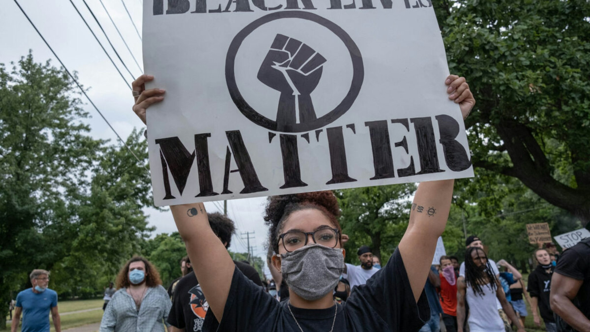 Non-Violent protesters march against police brutality near Detroit's west side, where 20-year-old Hakeem Littleton was shot and killed by Detroit Police earlier in the day, July 10,2020. Video footage released by Police Chief James Craig, within hours of the shooting appeared to show Littleton firing a gun at an officer from close range before being shot. Anti-Police brutality protesters have been marching in Detroit nearly everyday since the May 25, 2020 death of George Floyd at the hands of a white Minneapolis police officer.