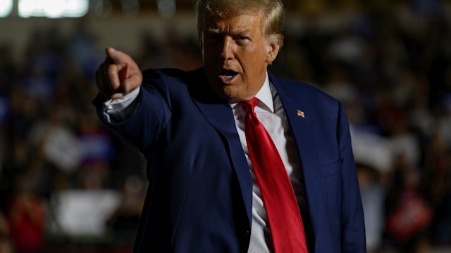 ERIE, PENNSYLVANIA - JULY 29: Former U.S. President Donald Trump gestures as he enters the Erie Insurance Arena for a political rally while campaigning for the GOP nomination in the 2024 election on July 29, 2023 in Erie, Pennsylvania. (Photo by Jeff Swensen/Getty Images)