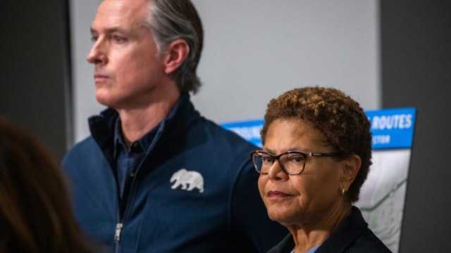 LOS ANGELES, CA NOVEMBER 12, 2023: Governor Gavin Newsom, left, and Los Angeles Mayor Karen Bass, right, speak during a press conference at the Caltrans District 7 headquarters on the damage from a fire under Interstate 10 near downtown Los Angeles, CA November 12, 2023. A section of the 10 Freeway in downtown Los Angeles that was damaged in a devastating fire over the weekend will remain closed indefinitely until repairs can be made, posing major traffic challenges for the region.