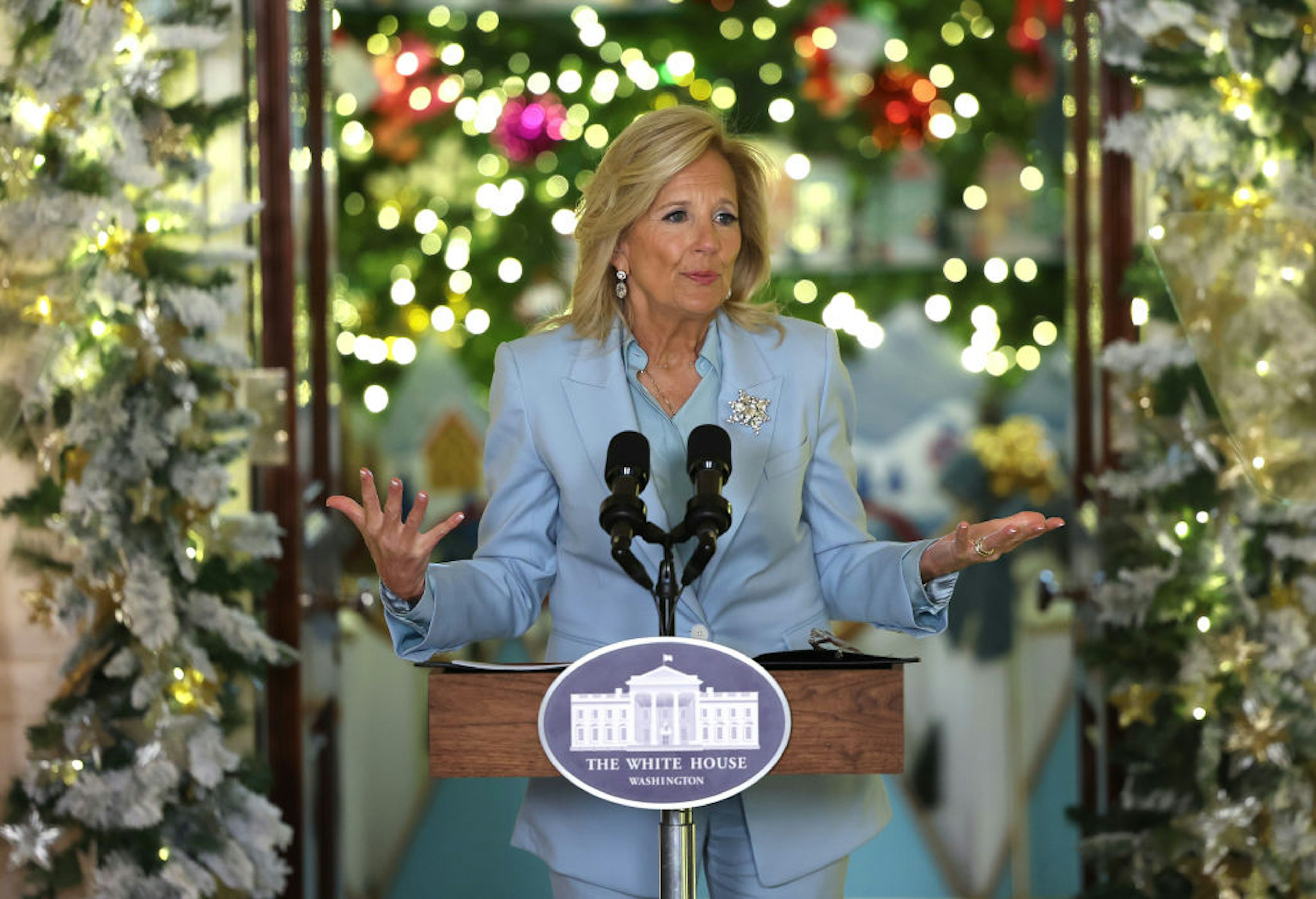 WASHINGTON, DC - NOVEMBER 27: First lady Jill Biden speaks about the holiday season and unveils the White House holiday decor while thanking volunteers who helped set it up, at the White House on November 27, 2023 in Washington, DC. The theme for this year's White House decorations is “Magic, Wonder and Joy,” and is designed to capture the “delight and imagination of childhood.” The White House expects to welcome approximately 100,000 visitors during the holiday season. (Photo by Kevin Dietsch/Getty Images)